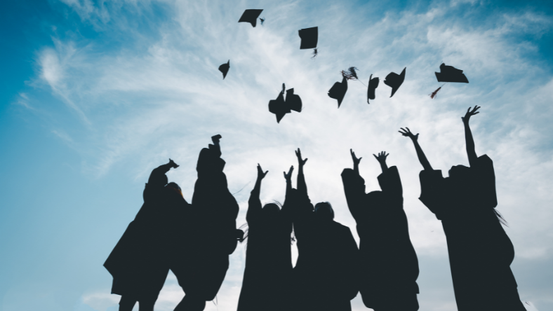 Graduation ceremony tossing caps