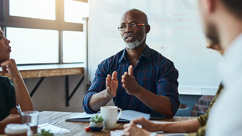 Man speaking during a business meeting