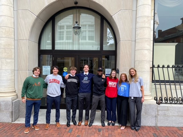 Salem Five intern group standing outside of Bank in July 2024.