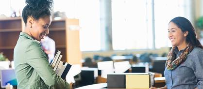 Woman carrying books